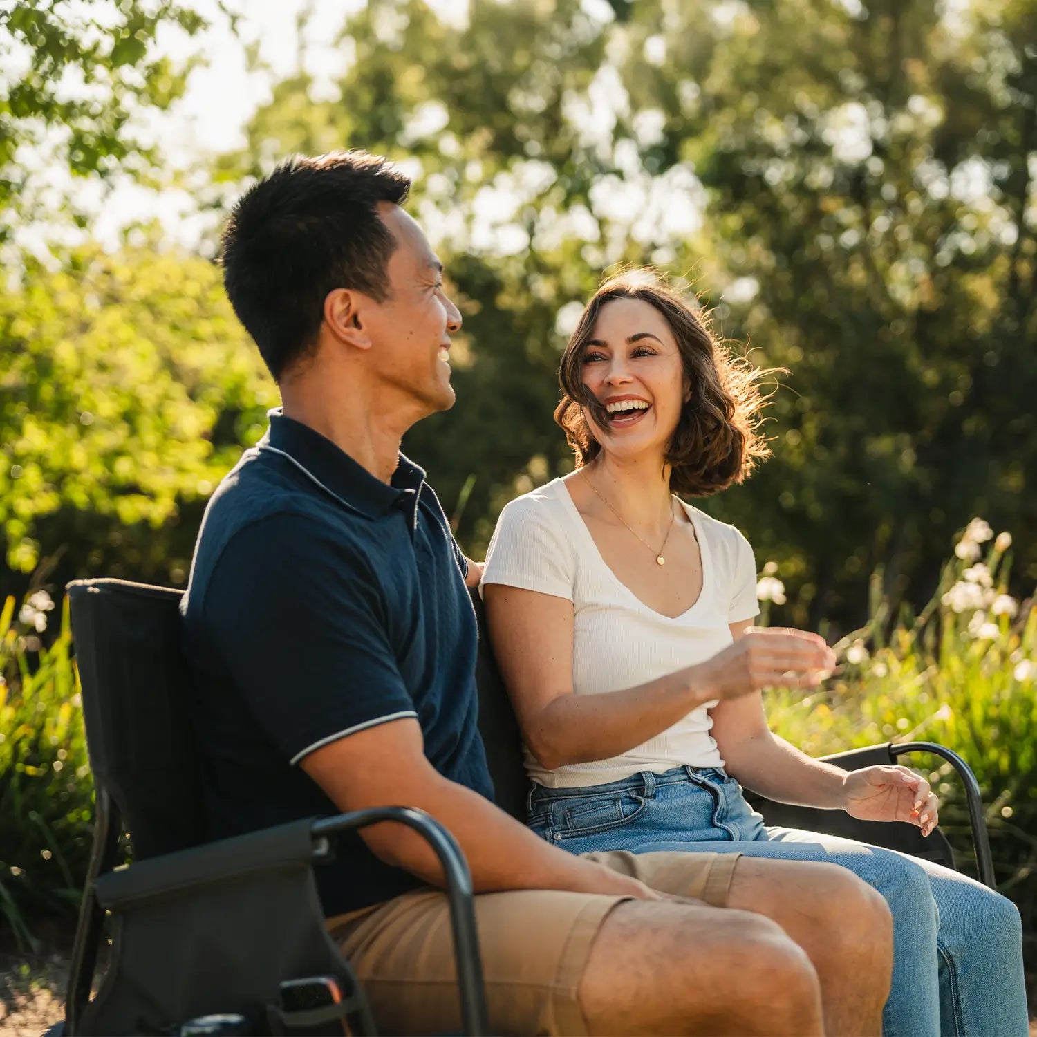 Tandem-Rocker-Park-Couple-Sitting-Laughing